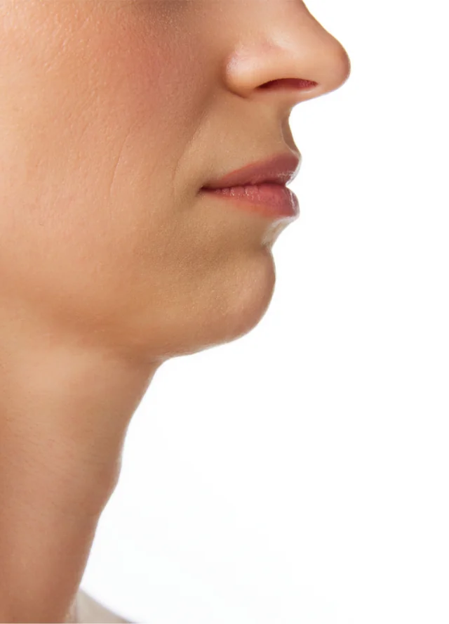 Profile of a woman's chin and jawline