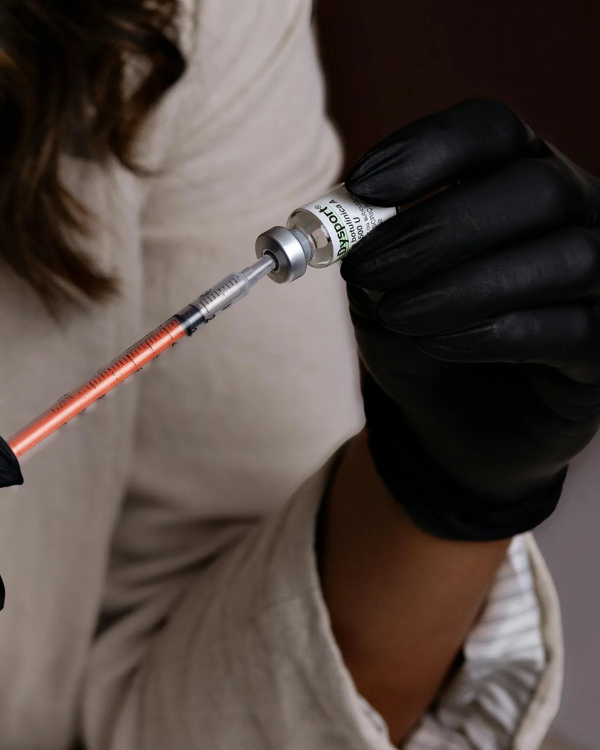 Provider preparing a Dysport injection at Advanced Aesthetics