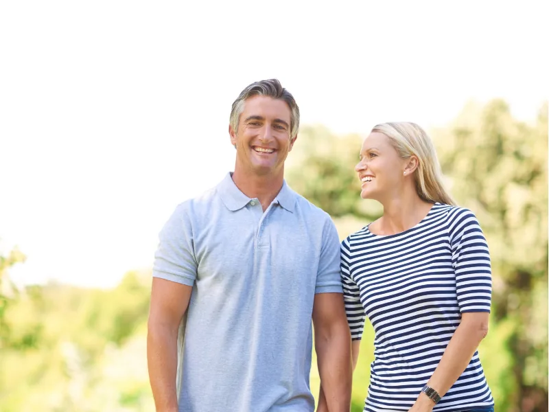 Couple walking together outdoors